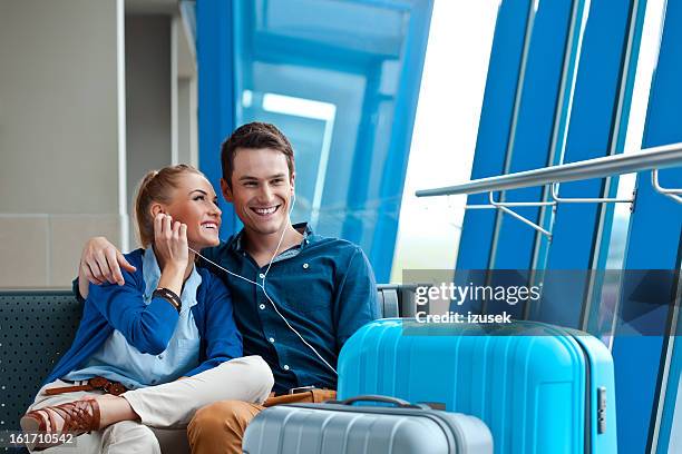 waiting for the plane - couple airport stock pictures, royalty-free photos & images