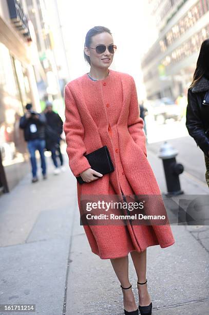 Olivia Wilde attends the Calvin Klein show wearing a Calvin Clein jacket on February 14, 2013 in New York City.