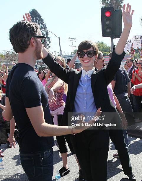 Actors/husband and wife Adam Shulman and Anne Hathaway attend the kick-off for One Billion Rising in West Hollywood on February 14, 2013 in West...
