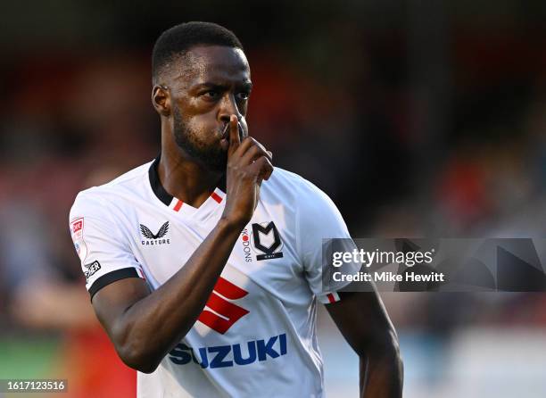 Mohamed Eisa of MK Dons celebrates after scoring the team's first goal during the Sky Bet League Two match between Crawley Town and Milton Keynes...