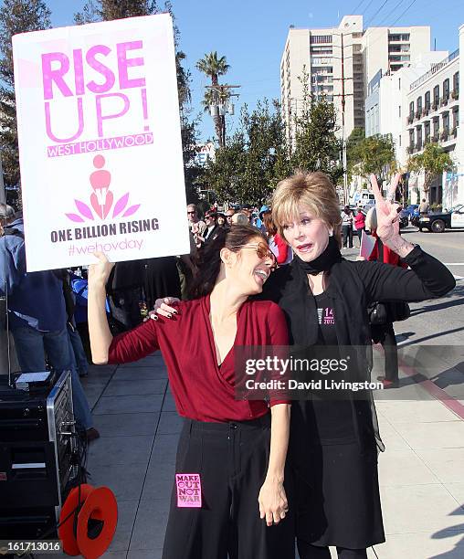 Actresses Marisa Tomei and Jane Fonda attend the kick-off for One Billion Rising in West Hollywood on February 14, 2013 in West Hollywood, California.