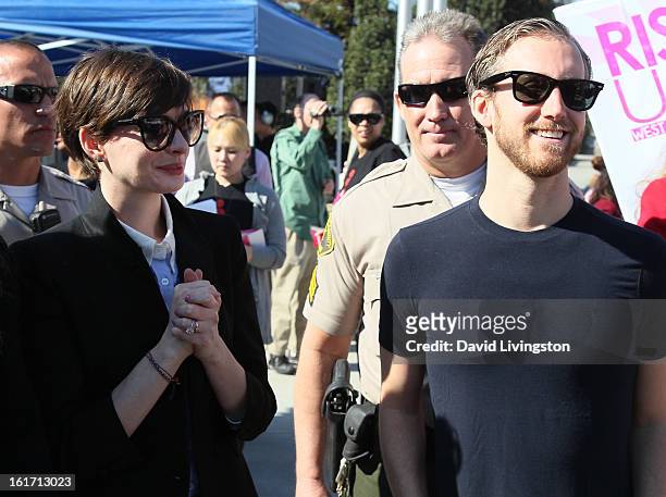 Actress Anne Hathaway and husband actor Adam Shulman attend the kick-off for One Billion Rising in West Hollywood on February 14, 2013 in West...