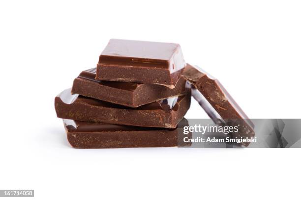 chocolate - chocolate chunks on white stock pictures, royalty-free photos & images