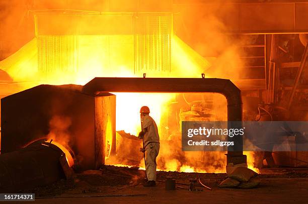 iron worker - glowing hot steel stock pictures, royalty-free photos & images