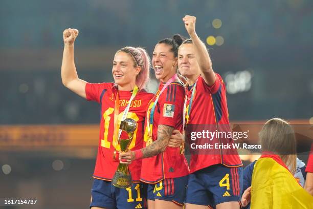 World Cup: Spain players Alexia Putellas, Jennifer Hermoso and Irene Paredes celebrate with the Golden Ball trophy following victory vs England...