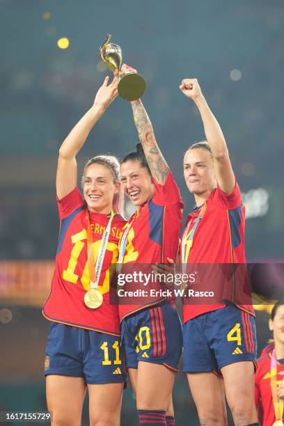 World Cup: Spain players Alexia Putellas, Jennifer Hermoso and Irene Paredes celebrate with the Golden Ball trophy following victory vs England...