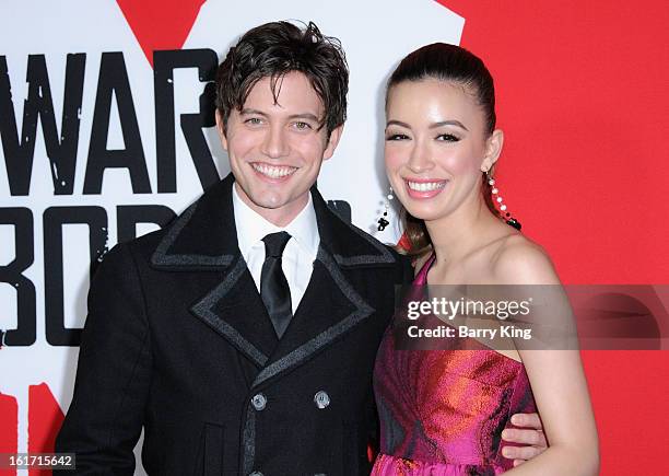 Actor Jackson Rathbone and actress Christian Serratos arrive at the Los Angeles Premiere 'Warm Bodies' at ArcLight Cinemas Cinerama Dome on January...