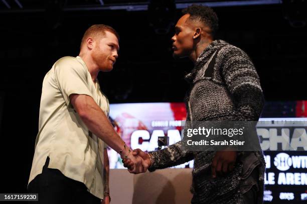 Canelo Alvarez of Mexico and Jermell Charlo face off during a press conference to preview their September 30 super middleweight undisputed...