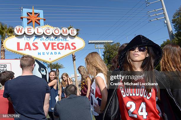 And Sports Illustrated Model Jessica Gomes support the NCAA Basketball Conference Championship at the historic Las Vegas sign on February 14, 2013 in...