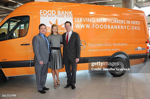 Model Jessica Hart, General Sales Manager Mercedes-Benz Manhattan Tom Shanley and General Manager Mercedes-Benz Manhattan Blair Creed unveils the...