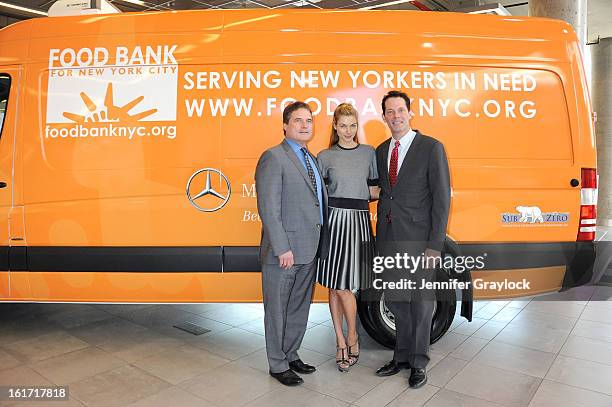 Model Jessica Hart, General Sales Manager Mercedes-Benz Manhattan Tom Shanley and General Manager Mercedes-Benz Manhattan Blair Creed unveils the...