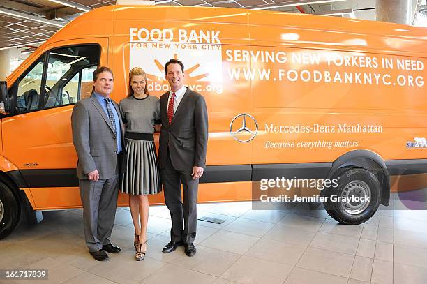 Model Jessica Hart, General Sales Manager Mercedes-Benz Manhattan Tom Shanley and General Manager Mercedes-Benz Manhattan Blair Creed unveils the...