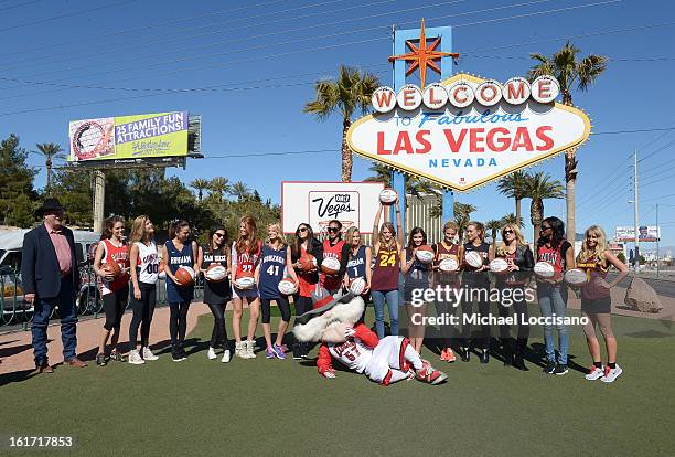 And Sports Illustrated Models support the NCAA Basketball Conference Championship at the historic Las Vegas sign on February 14, 2013 in Las Vegas,...