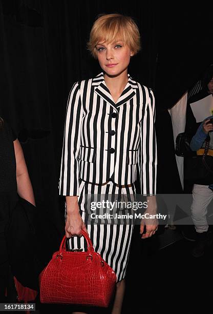 Model Jessica Stam backstage at the Marc Jacobs Collection Fall 2013 fashion show during Mercedes-Benz Fashion Week at New York Armory on February...