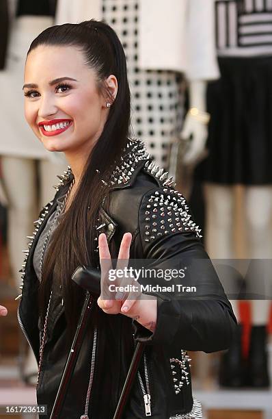 Demi Lovato attends Topshop Topman LA Grand Opening at The Grove on February 14, 2013 in Los Angeles, California.