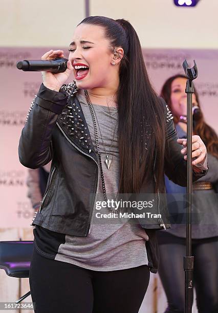 Demi Lovato performs at Topshop Topman LA Grand Opening at The Grove on February 14, 2013 in Los Angeles, California.