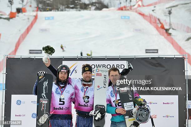 Austria's Ingemar Walder , Andreas Prommegger and Slovenia's Rok Flander celebrate at the podium after the Snowboard World Cup Men's Parallel Giant...