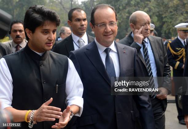 Indian Minister of State for power, Jyotiraditya Scindia , talks with French President Francois Hollande after a Madhavrao Scindia Foundation...