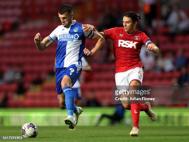 John Marquis of Bristol Rovers battles for possession with George Dobson of Charlton Athletic during the Sky Bet League One match between Charlton...