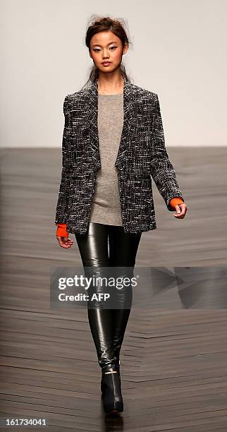 Model presents a creation by designer Zoe Jordan during the 2013 Autumn/Winter London Fashion Week in London on February 15, 2013. AFP PHOTO/ANDREW...