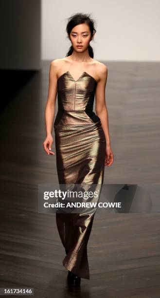 Model presents a creation by designer Zoe Jordan during the 2013 Autumn/Winter London Fashion Week in London on February 15, 2013. AFP PHOTO/ANDREW...