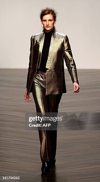 Model presents a creation by designer Zoe Jordan during the 2013 Autumn/Winter London Fashion Week in London on February 15, 2013. AFP PHOTO/ANDREW...