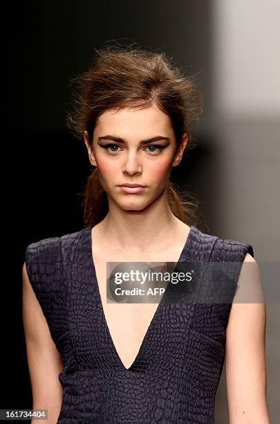 Model presents a creation by designer Zoe Jordan during the 2013 Autumn/Winter London Fashion Week in London on February 15, 2013. AFP PHOTO/ANDREW...