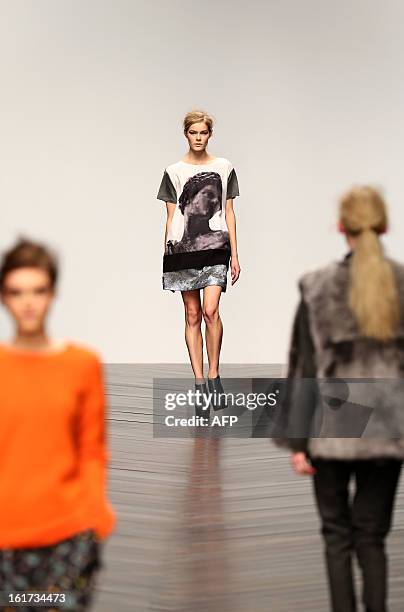 Models present creations by designer Zoe Jordan during the 2013 Autumn/Winter London Fashion Week in London on February 15, 2013. AFP PHOTO/ANDREW...