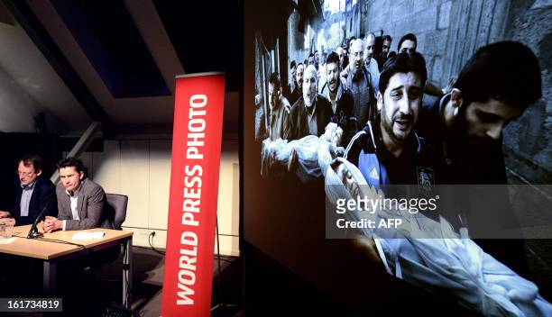 World Press Photo jury president Santiago Lyon and Managing Director of World Press Photo Michael Munneke are pictured during the announcement of the...