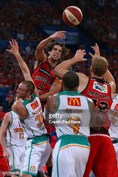 Matthew Knight of the Wildcats passes the ball during the round 19 NBL match between the Perth Wildcats and the Townsville Crocodiles at Perth Arena...