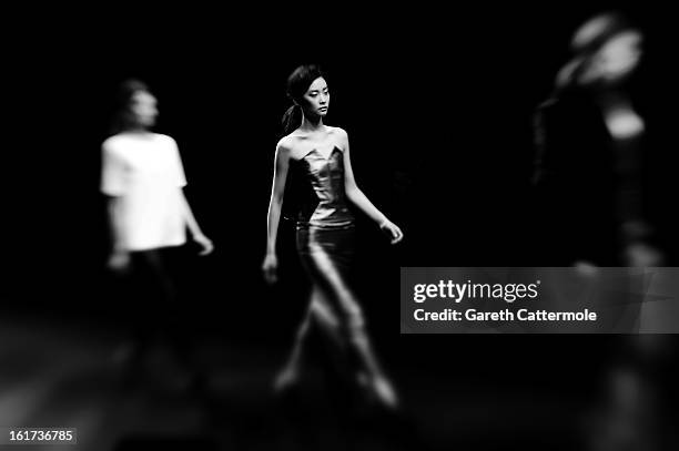 Model walks the runway during the Zoe Jordan show during London Fashion Week Fall/Winter 2013/14 at Somerset House on February 15, 2013 in London,...