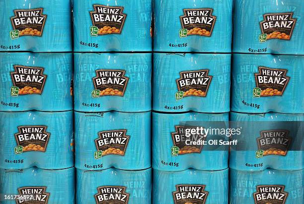 Tins of H.J. Heinz Co. Baked Beanz on February 15, 2013 in London, England. Billionaire investor Warren Buffett's Berkshire Hathaway is is teaming up...