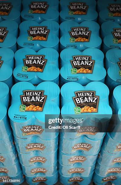 Tins of H.J. Heinz Co. Baked Beanz on February 15, 2013 in London, England. Billionaire investor Warren Buffett's Berkshire Hathaway is is teaming up...