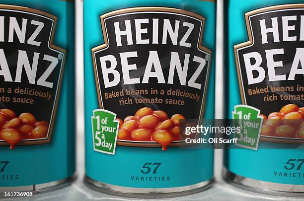 Tins of H.J. Heinz Co. Baked Beanz on February 15, 2013 in London, England. Billionaire investor Warren Buffett's Berkshire Hathaway is is teaming up...