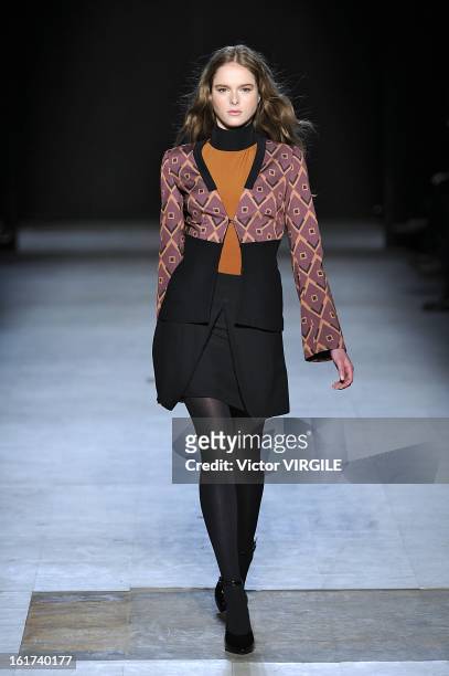 Model walks the runway at the Giulietta Ready to Wear Fall/Winter 2013-2014 fashion show during Mercedes-Benz Fashion Week at Cafe Rouge on February...