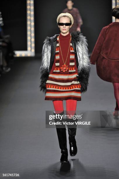 Model walks the runway at the Anna Sui Ready to Wear Fall/Winter 2013-2014 fashion show during Mercedes-Benz Fashion Week at The Theatre at Lincoln...