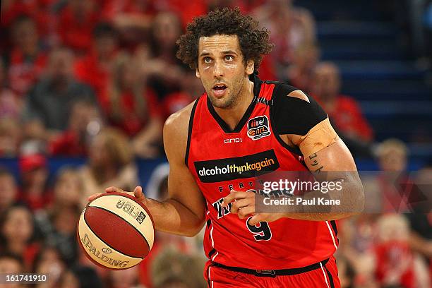 Matthew Knight of the Wildcats brings the ball up the court during the round 19 NBL match between the Perth Wildcats and the Townsville Crocodiles at...