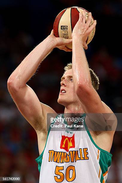 Luke Nevill of the Crocodiles shoots a free throw during the round 19 NBL match between the Perth Wildcats and the Townsville Crocodiles at Perth...