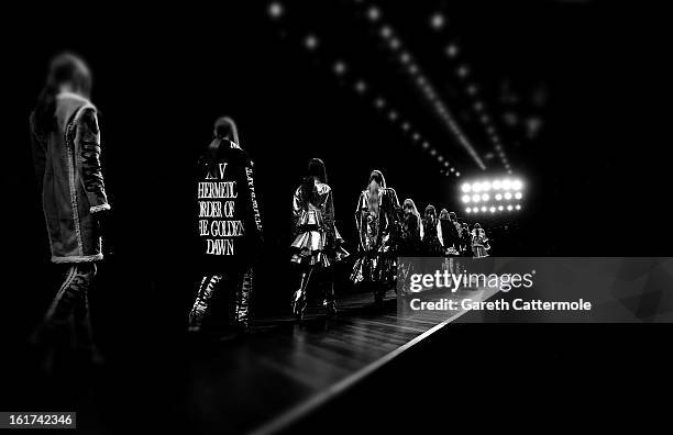 Model walks the runway during the KTZ show as part of London Fashion Week Fall/Winter 2013/14 at Somerset House on February 15, 2013 in London,...