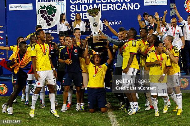 Players of Colombia celebrate victory after a match between Colombia and Paraguay as part of the 2013 South American Youth Championship at Malvinas...