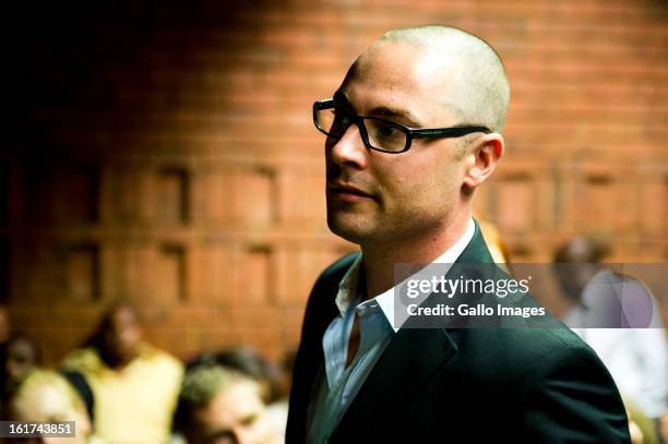 Carl Pistorius attends the Pretoria Magistrate court hearing on February 15 in Pretoria, South Africa. Oscar Pistorius stands accused of murder after...
