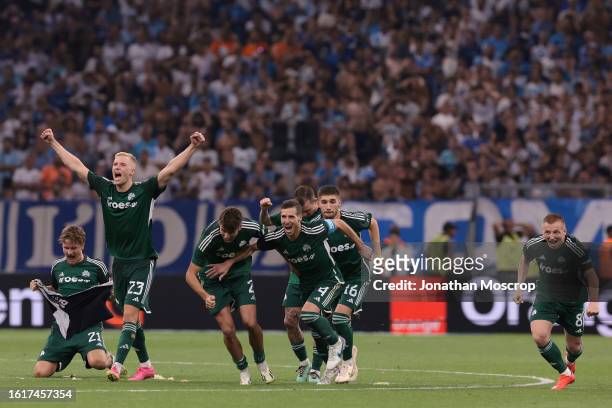 Panathinaikos players reacts as Filip Mladenovic scores the decisive penalty in the shoot out of the UEFA Champions League Third Qualifying Round 2nd...