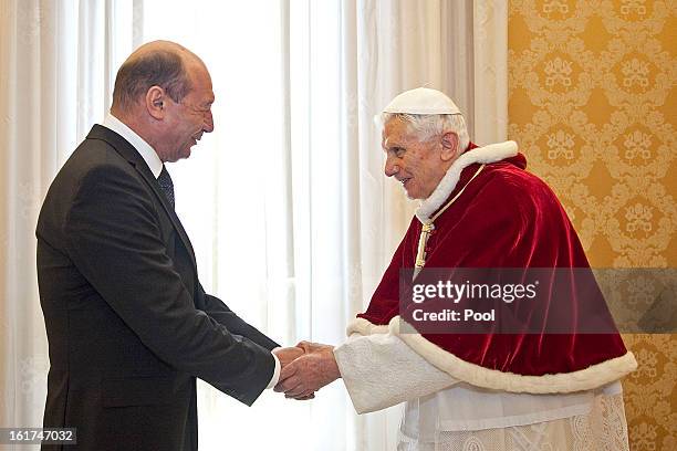 Pope Benedict XVI receives President of Romania Traian Basescu at his private library on February 15, 2013 in Vatican City, Vatican.