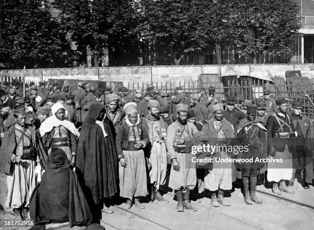 Wounded French colonial troops at the Battle of Aisne are ready to go back to the front after having their wounds dressed, France, mid 1910s. They...