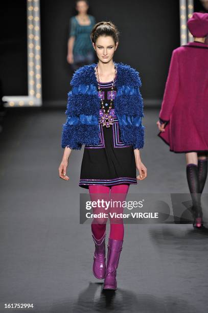 Model walks the runway at the Anna Sui Ready to Wear Fall/Winter 2013-2014 fashion show during Mercedes-Benz Fashion Week at The Theatre at Lincoln...