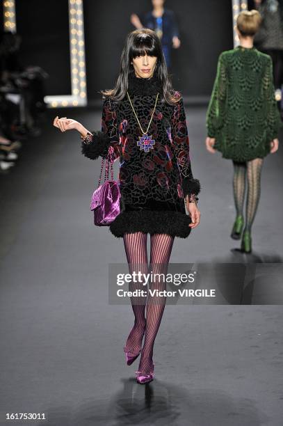 Model walks the runway at the Anna Sui Ready to Wear Fall/Winter 2013-2014 fashion show during Mercedes-Benz Fashion Week at The Theatre at Lincoln...