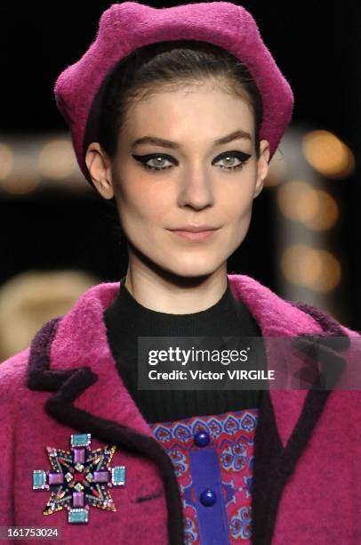 Model walks the runway at the Anna Sui Ready to Wear Fall/Winter 2013-2014 fashion show during Mercedes-Benz Fashion Week at The Theatre at Lincoln...