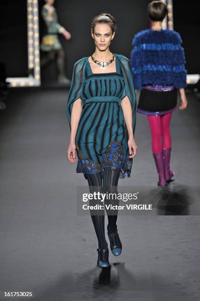 Aymeline Valade walks the runway at the Anna Sui Ready to Wear Fall/Winter 2013-2014 fashion show during Mercedes-Benz Fashion Week at The Theatre at...