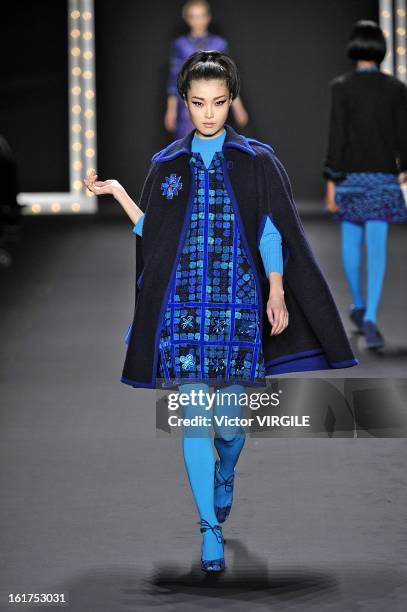 Model walks the runway at the Anna Sui Ready to Wear Fall/Winter 2013-2014 fashion show during Mercedes-Benz Fashion Week at The Theatre at Lincoln...