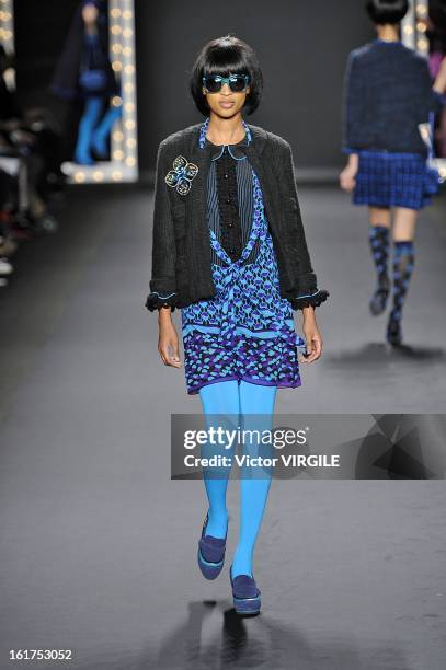 Model walks the runway at the Anna Sui Ready to Wear Fall/Winter 2013-2014 fashion show during Mercedes-Benz Fashion Week at The Theatre at Lincoln...